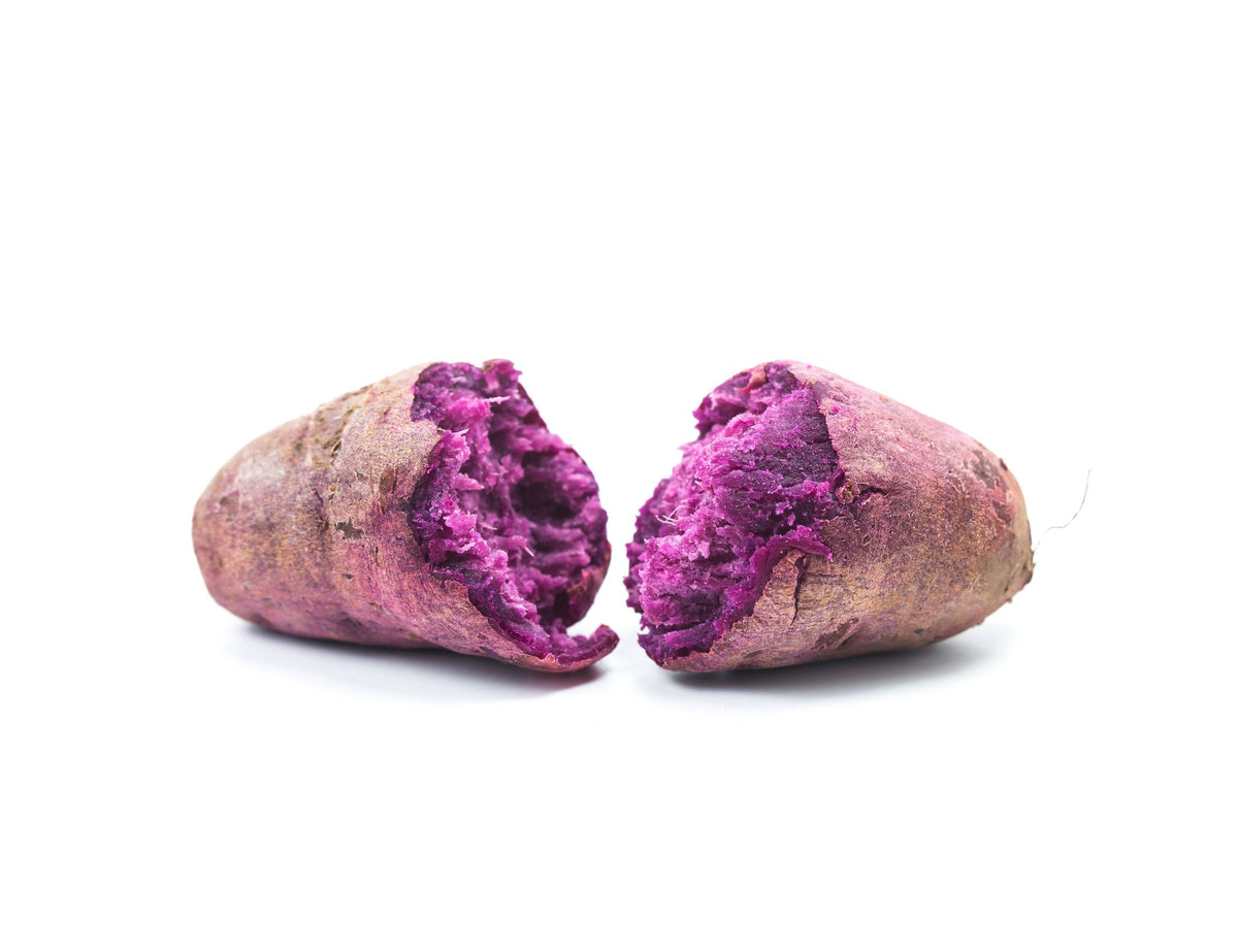 holding japanese sweet purple yam ube, sweet potatoe, ube, yam, purple, japanese, nutiness, vanilla, healthy, ube, taro, fresh, sweet, vanilla. nutty, japanese, healthy, macros