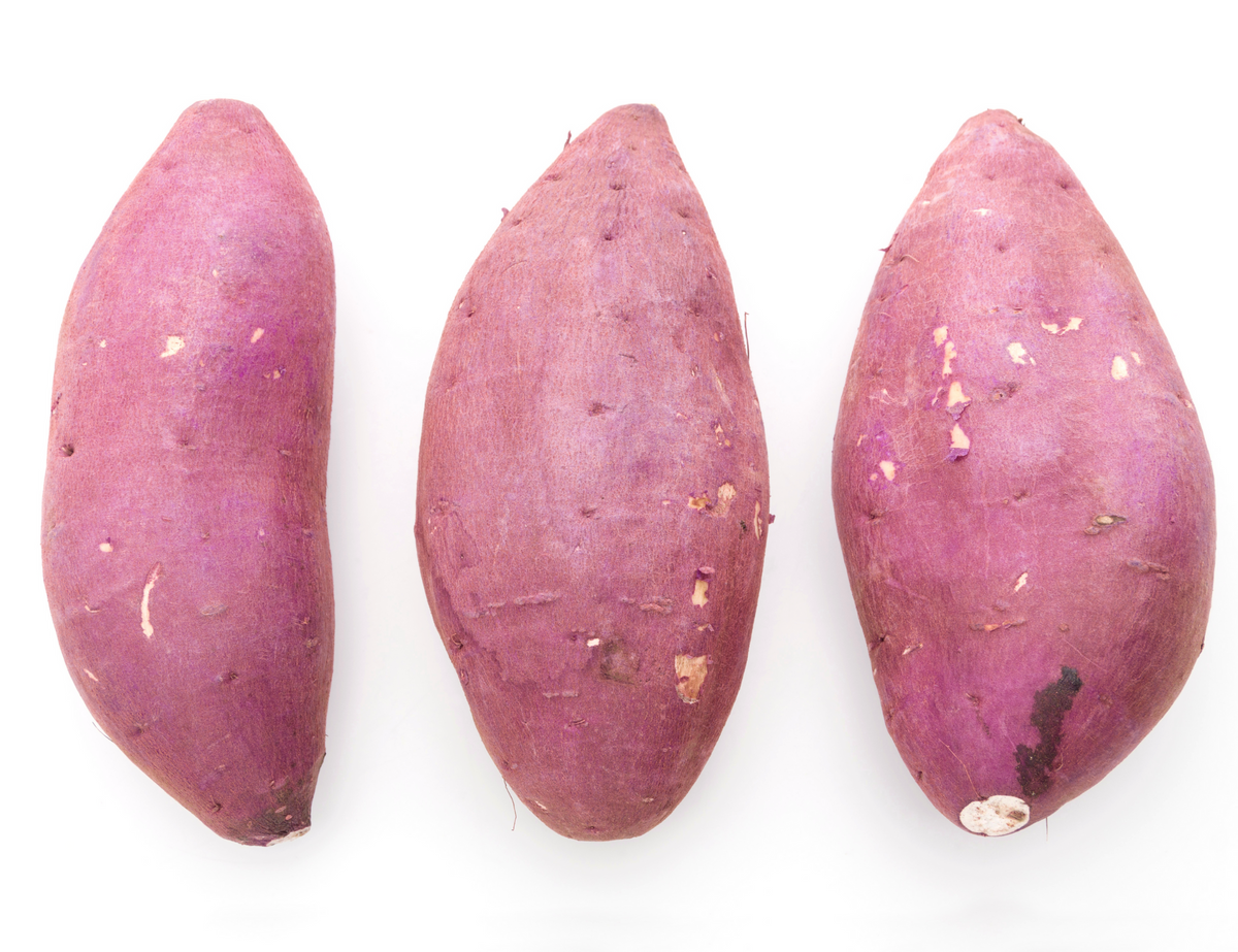 "Handpicked Japanese sweet potatoes, also known as Oriental sweet potatoes or Japanese yams. These artisanal, dry-fleshed root vegetables boast a distinctive red-purple skin and a creamy white to pale yellow flesh, offering a sweet, starchy flavor that's perfect for a variety of culinary creations."
