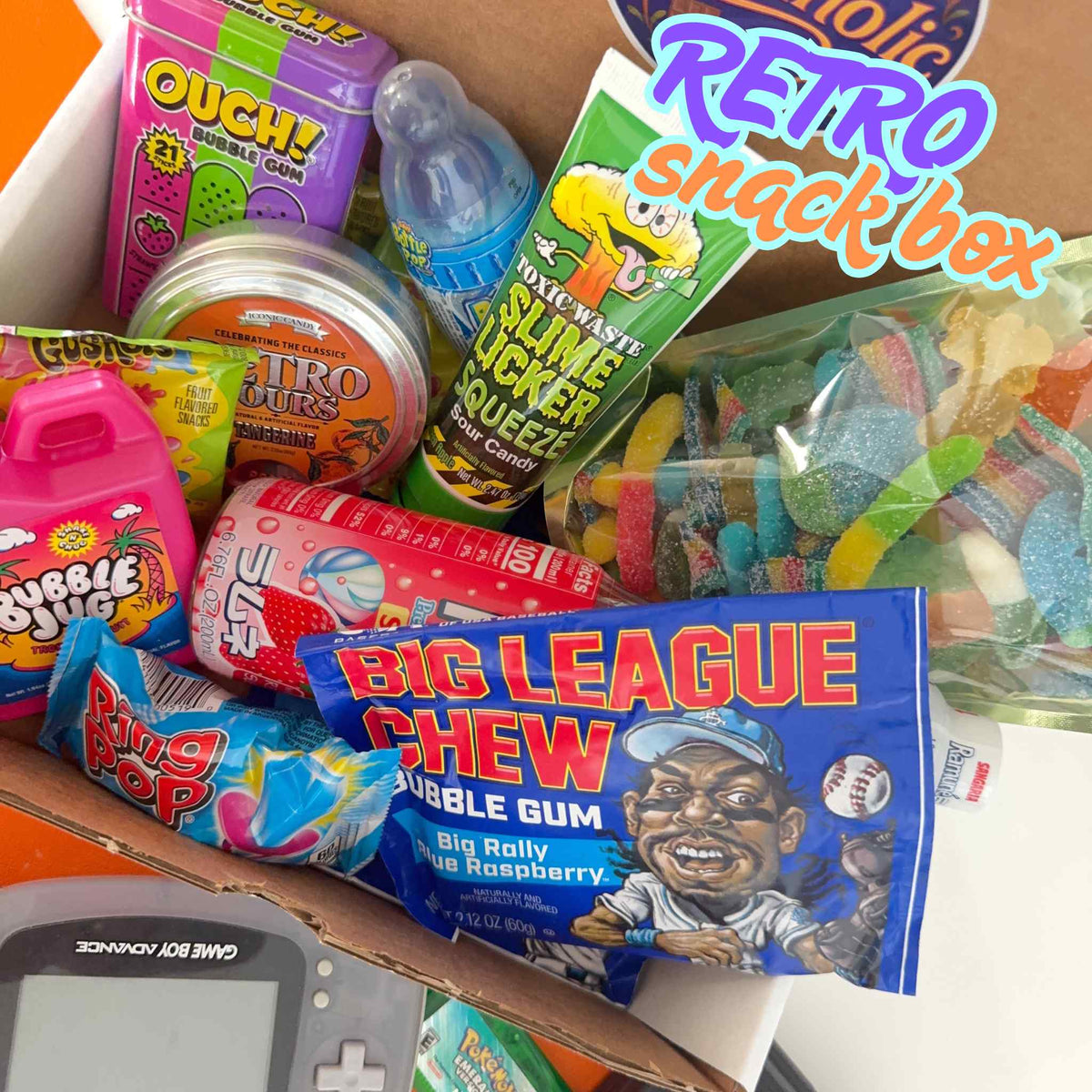 Assorted retro candy and toys in a box labeled 'Retro Snack Box'.